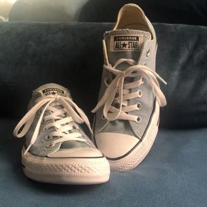 Converse in light blue, size 9 and gently worn.